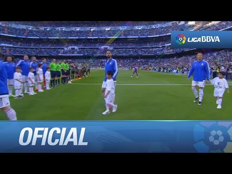 Real Madrid y Málaga CF saltando al Bernabéu