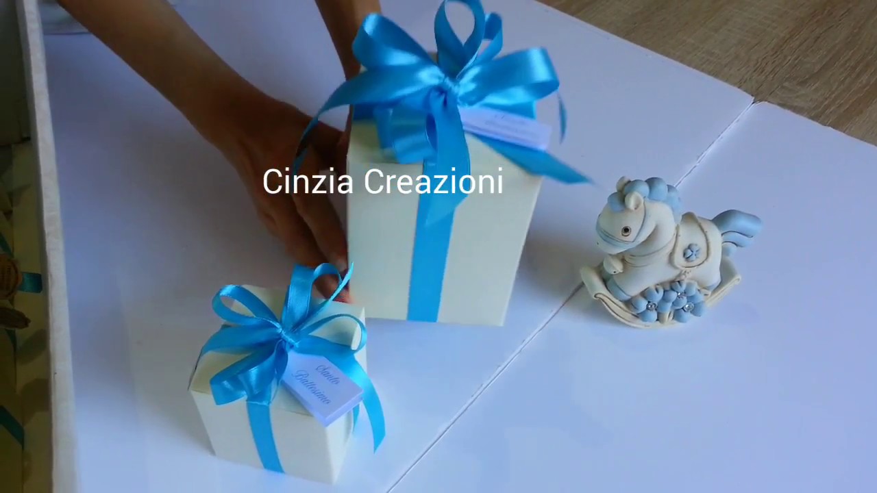 Bomboniere Battesimo Cavallo a dondolo celeste cavallino confezionamento bomboniera