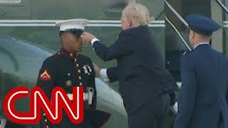 Trump stops to retrieve Marine&#39;s hat