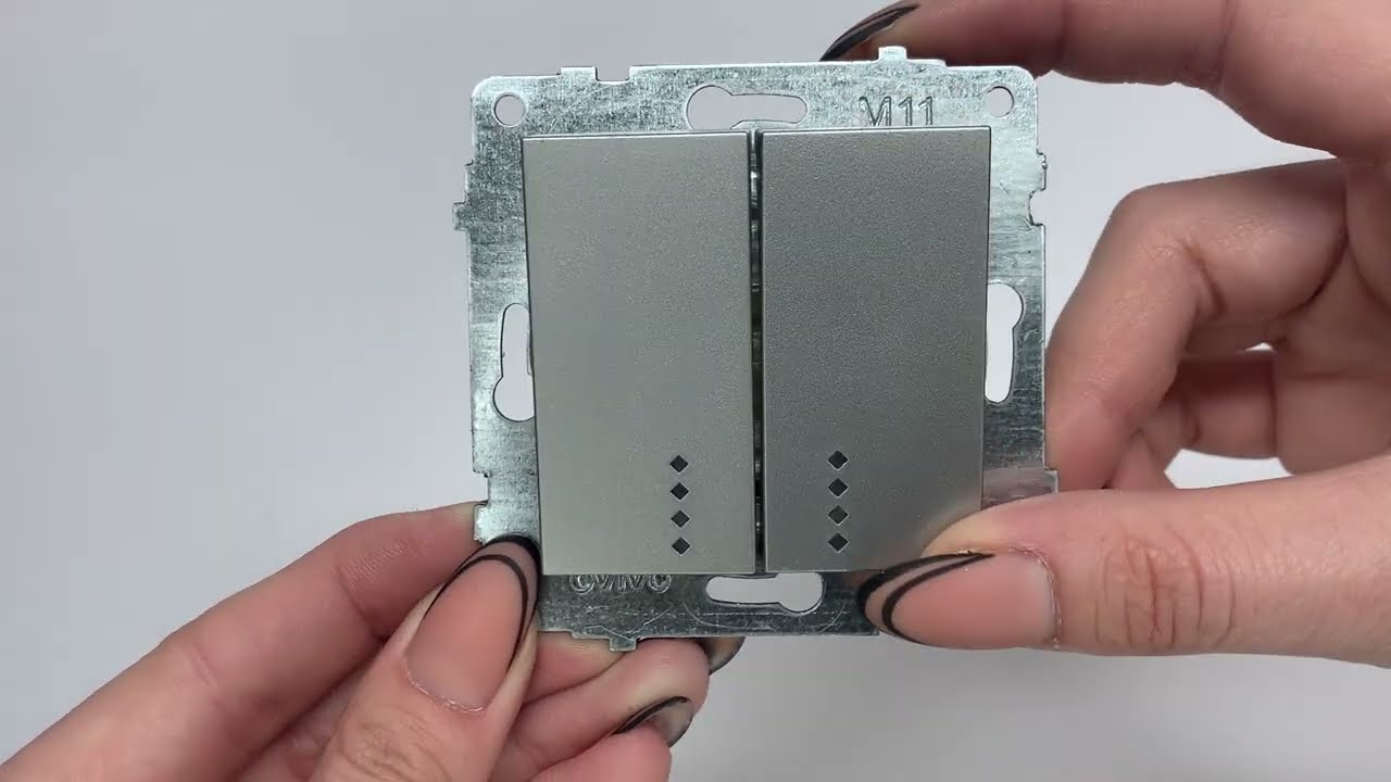 Вимикач двоклавішний з підсвіткою OVIVO Grano срібло (600-000210-203)