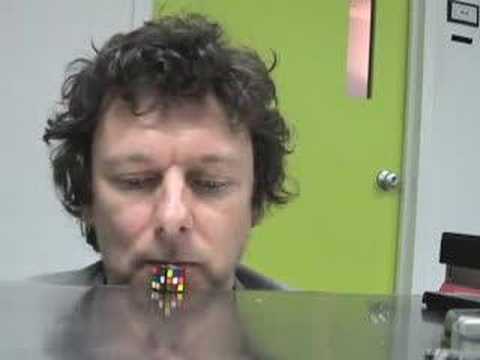 Michel Gondry Solves a Rubiks Cube with his Nose