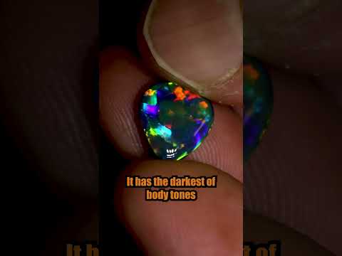 Black opal at its best $16,000 a carat #blackopal #gemstone #opal