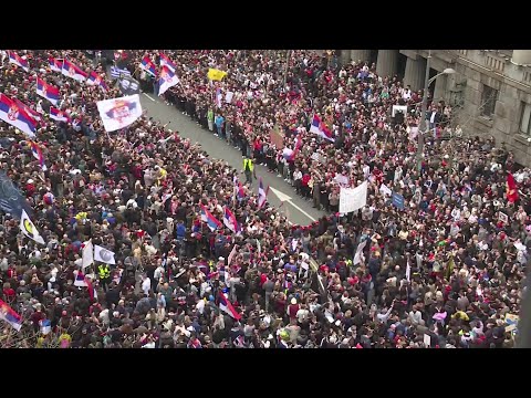 Tens of thousands gather in front of Serbia's Parliament for anti-graft rally | AFP