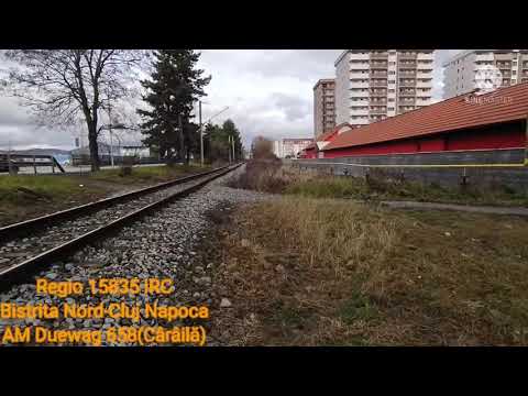 AM Duewag 658 al Interregional Călători trecând în viteză sub pasarela Dedeman din Bistrița