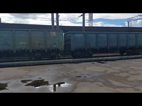 2TE116-690 (BaTS) with loaded coal wagons passing main station Riga-Pasazieru