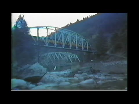 1046. UNION PACIFIC UP 3763 at 2 bridges in feather river canyon on March 1989 with 4 freight engine