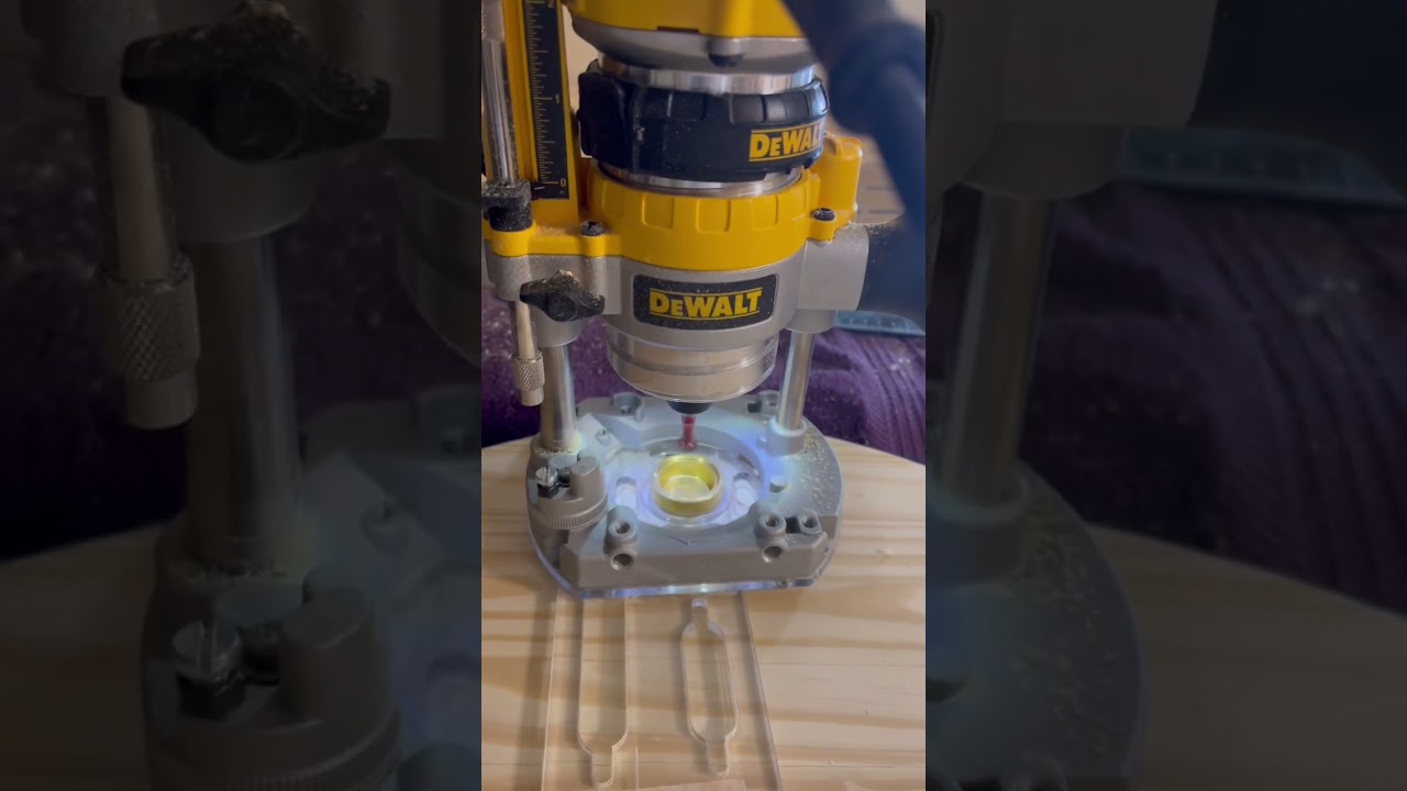 Using a router and acrylic template to make keyholes