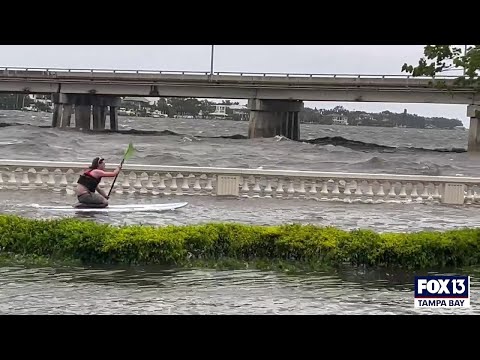 Florida man paddles down flooded Tampa street after Hurricane Idalia