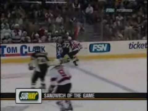 Jarkko Ruutu hits Zubrus into the bench