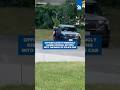 Officer Caught Seemingly Kissing Woman Getting Into Back Of Police Car