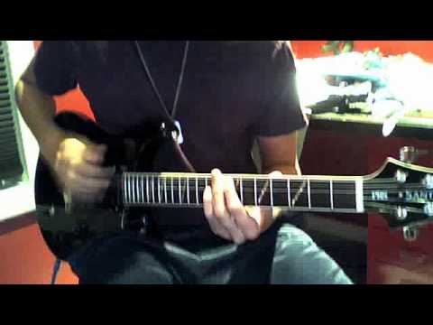 Pat Loewen playing the guitar