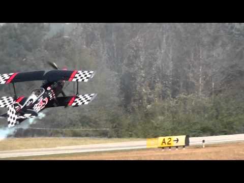 Skip Stewart flies between two hangars in Adalusia, AL