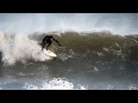 SURFERS CHARGE IMPOSSIBLE SHORE BREAK