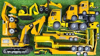 Mencocokkan Pasangan Trailer Truk dan Excavator Warna Kuning