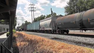 preview picture of video 'CSX SD50 8620 leads a long Mixed Freight Train through Congers in HD'