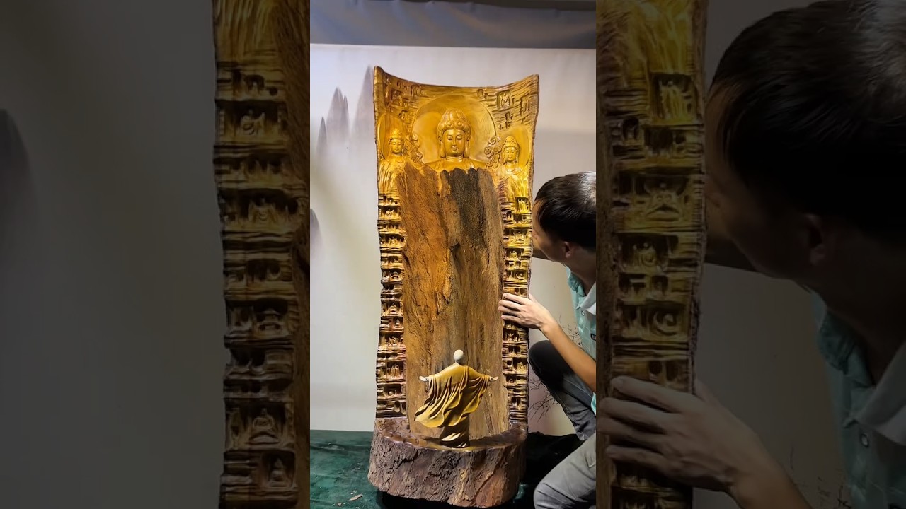 “Buddha Rising from Nature 🌳🧘‍♂️🔥#statue #art #woodworking #buddha #wood craft#vishuart #travel