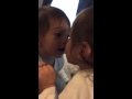 Baby kissing the mirror 