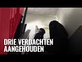 Beelden: politieinval in Amsterdamse woning