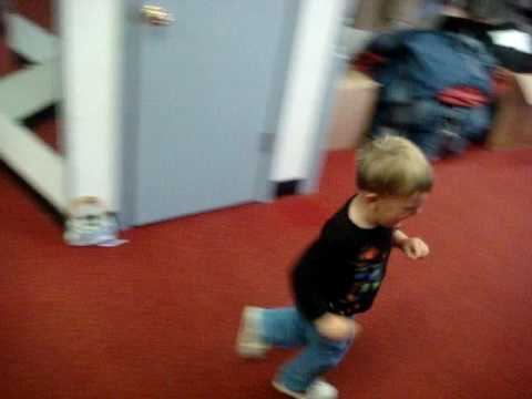 What kids do while trying on tuxedos