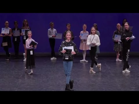 Rebeca Maria Zamfir (11) receiving the Hope Award at the YAGP Paris 2023 Award ceremony