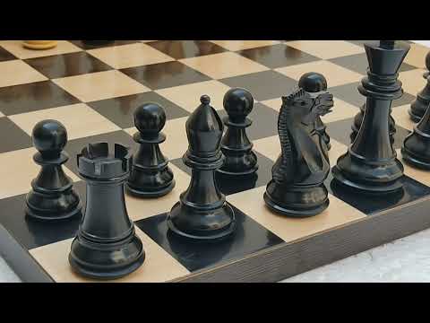 Wooden square borderless pure ebony and maple wood chess set...