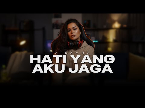 HATI YANG AKU JAGA - XIEXARA | Sad Slow Emotional Flow Rap | Official Lyric