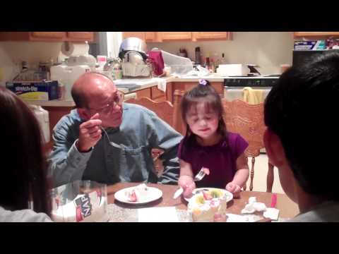 Kaylin feeding Gong cake.