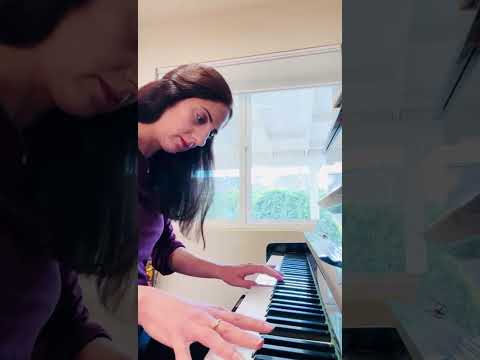 Galit playing piano