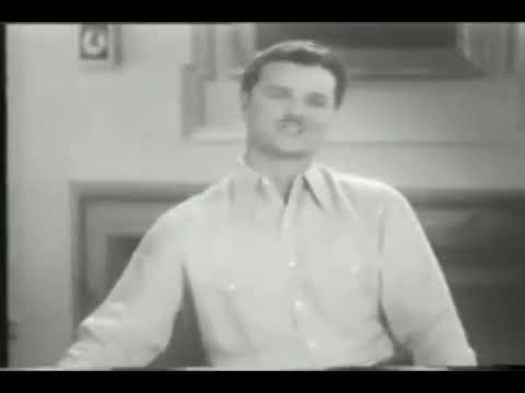 LAWRENCE TIBBETT SINGS   WITHOUT A SONG 1930 FILM CLIP