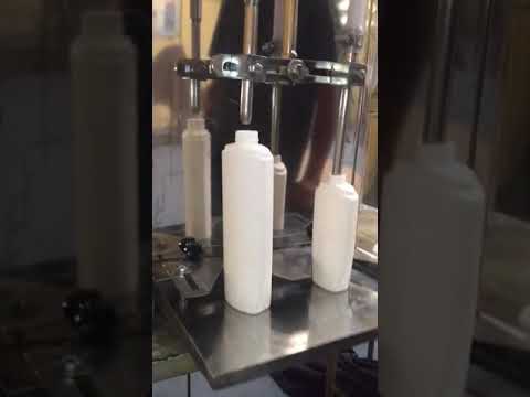 Semi Automatic Volumetric Liquid Filling Machine