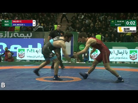 Round 3 FS - 65 kg: C. VALIEV (RUS) df. I. JULAKIDZE (GEO), 12-7