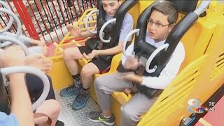 11-year-old boy with autism conquers fear of roller coasters