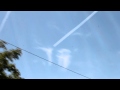 Jet With Trail Moves Through Letter Clouds MVI 2114 MOV