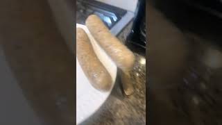 Person’s sausages keep rolling off the plate