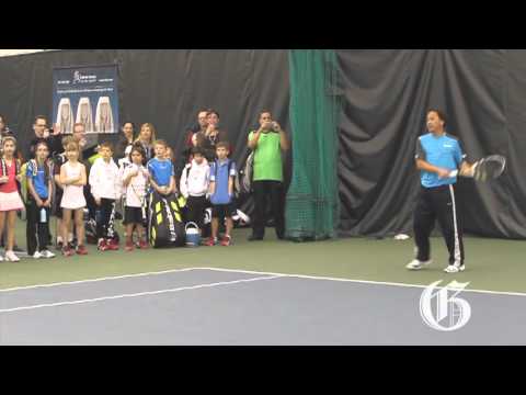 Tennis legend Michael Chang gives a clinic