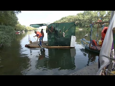 Volunteers clear up 86-kilometre stretch of River Tisza in Hungary