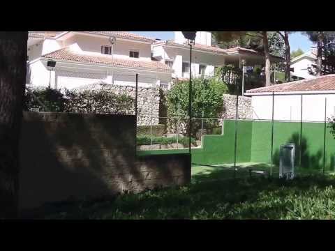 El Vergel the rear access, paddle tennis court, little house and garages.