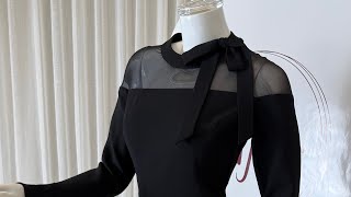 فستان دانتيل أسود مع تفاصيل دقيقة لمظهر فاخر