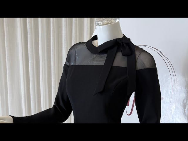 فستان دانتيل أسود مع تفاصيل دقيقة لمظهر فاخر