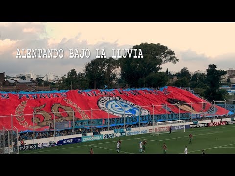 "Alentando bajo la lluvia  Belgrano vs Agropecuario  2020" Barra: Los Piratas Celestes de Alberdi &bull; Club: Belgrano &bull; País: Argentina