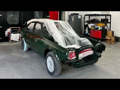 The Greenmaxhine BMW E30 Sedan by CAtuned
