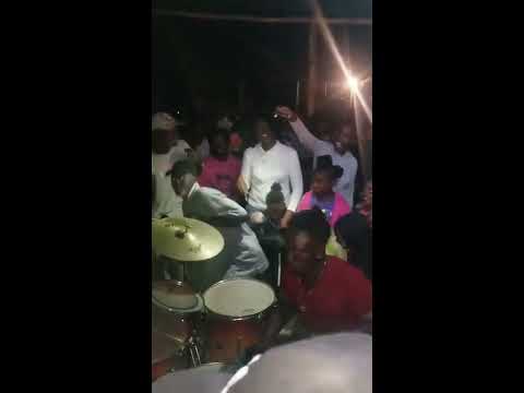 Jamaican nine night, "singing  boss shorty"