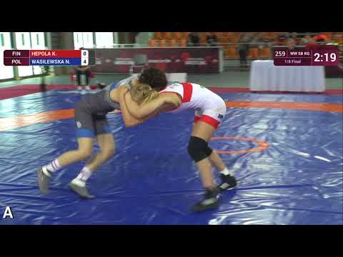 1/8 WW - 58 kg: K. HEPOLA (FIN) v. N. WASILEWSKA (POL)