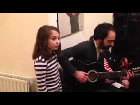 Rowan and her dad playing A Soalin by Peter Paul and Mary
