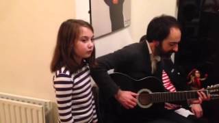 Rowan and her dad playing A Soalin by Peter Paul and Mary