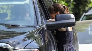 Jennifer Garner looks smitten as she chats with boyfriend John Miller near her Los Angeles home