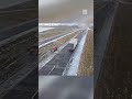 Truck loses control on icy Iowa road after winter storm