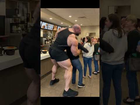 Giant body builder tired of waiting in line!