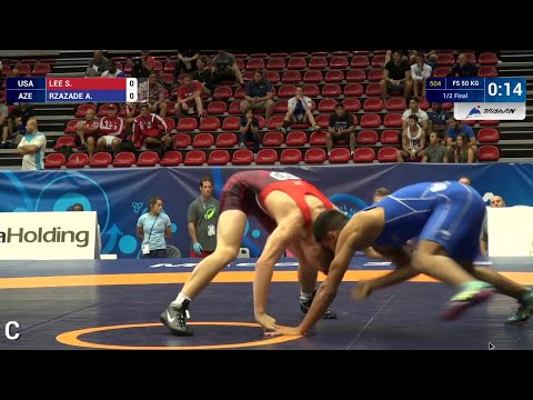 1/2 FS - 50 kg: S. LEE (USA) df. A. RZAZADE (AZE) by TF, 10-0