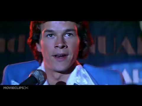 Boogie Nights official trailer thumbnail featuring Mark Wahlberg and neon club lights
